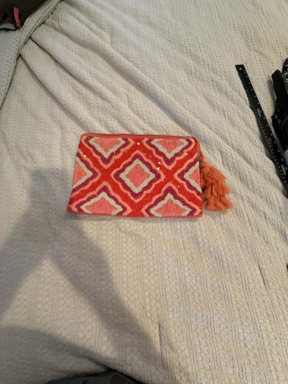 Anthropologie Coral Beaded Geometric Pattern Clutch Pouch with Tassel